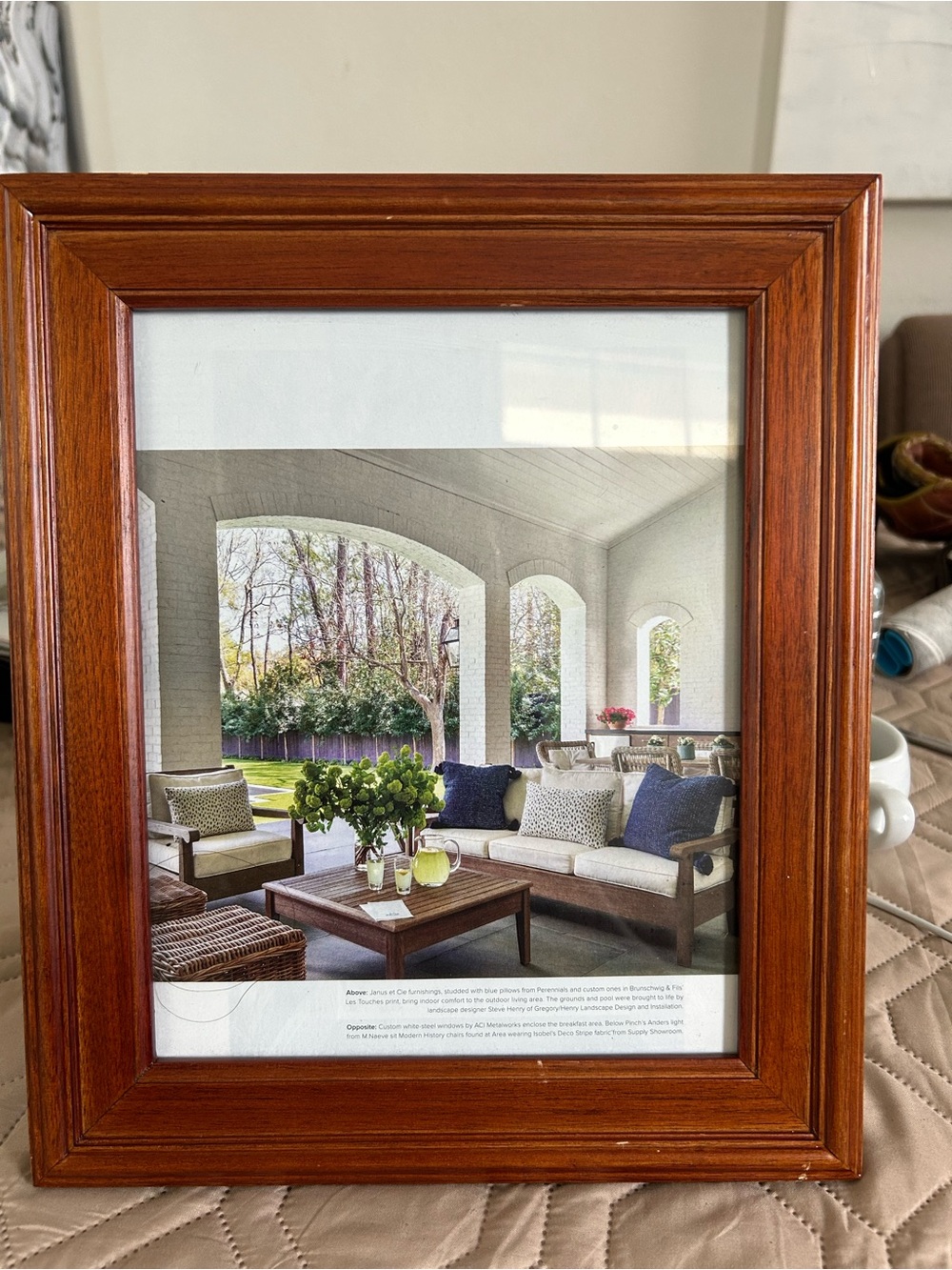 Used wooden photo frame in a warm brown tone, in excellent condition